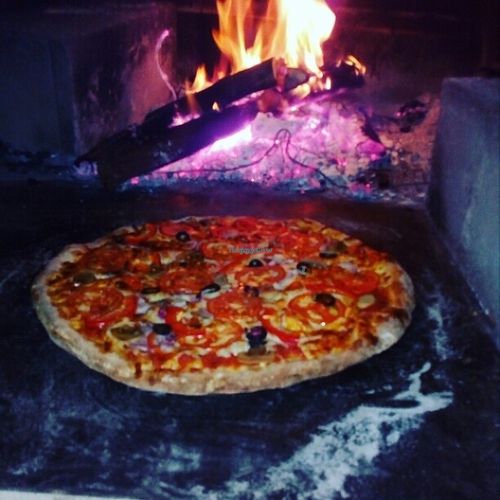 Pizza from wood fired oven in Bamboo Bar. Every day from 6 pm till 3 am. Vegetarian and vegan pizza at Bamboo Bar & Vegetarian Restaurant in Sihanoukville