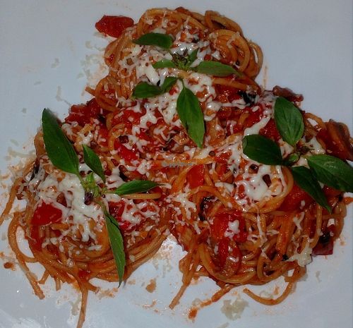 Spaghetti with tomato sauce, basil and cheese at Bamboo Bar & Vegetarian Restaurant in Sihanoukville