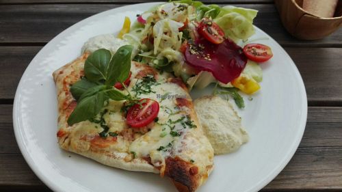 Filled tortilla with veggies and homemade dips at P'aa Restaurant Lounge in Linz