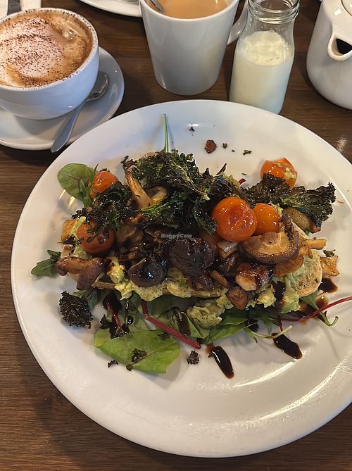 Vegan bruschetta and almond cappuccino   at Manna Cafe & Bistro in Killarney