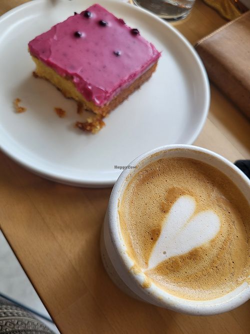 Vegan samali with blueberry glaze and vegan flat white at Møød in Euboea