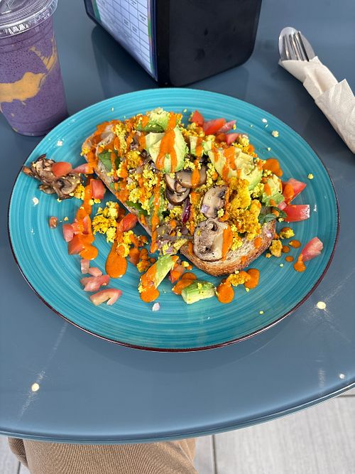 Tofu scramble and smoothie yum  at Nourish Wellness Cafe - Pop Life  in Cleveland
