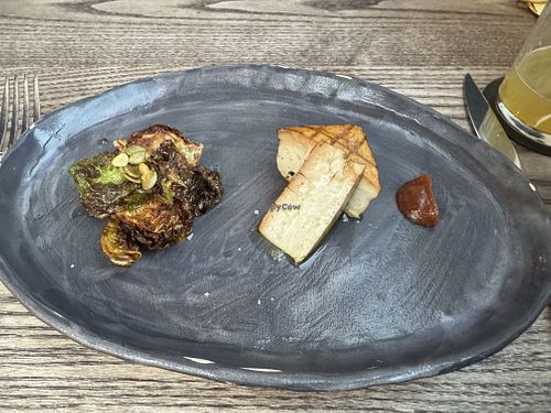 Grilled tofu, Brussels sprouts, smoked date saucee  at 3rd Cousin in San Francisco