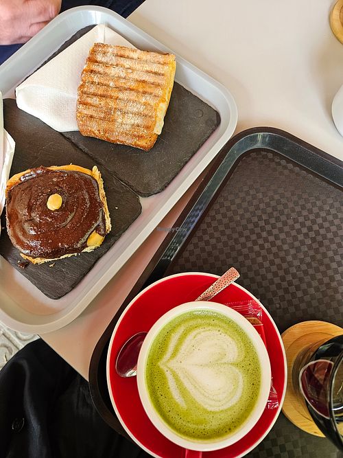 Matcha (soy milk), vegan cinnamon roll with homemade "nutella", toast at Cafeteria Tokio Barcelona in Barcelona
