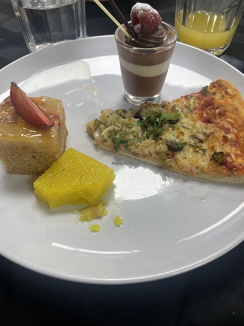 Vegan deserts and pizza   at Veg Delight   in Edmonton