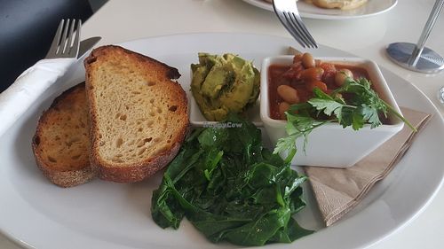 Sourdough, avocado, wilted baby spinach, house baked beans at Sprout Eden in Eden
