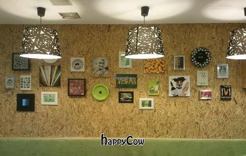 One of the walls inside the restaurant. This may give you some idea about the atmosphere. at Buddha Burgers in Haifa