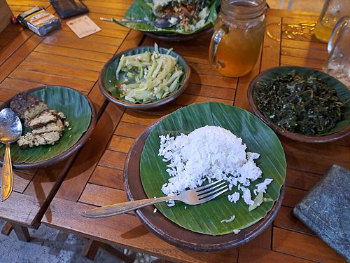 Rice, papaya leafs, pumpkin and tempeh at G'litik Indonesian Eatery in Jakarta