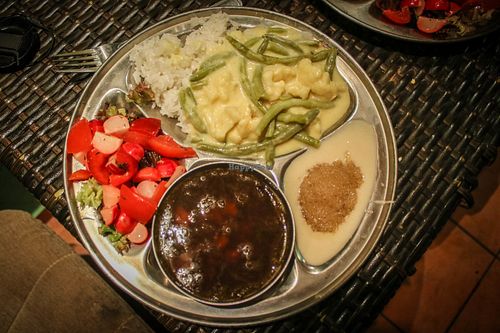daily menu - adzuki bean soup, subji with cauliflower, french beans and coconut milk, salad and halva at Ananta in Prague