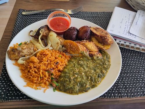 Jollof rice, supa, kelewele, puff puff & suya shrooms at Fankaasoo  in Groningen