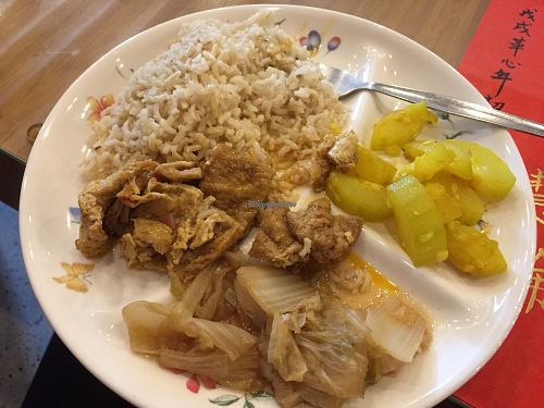 Winter melon with turmeric, boiled cabbage, tofu with tamarind, and brown rice. at Quay Cafe in Penang
