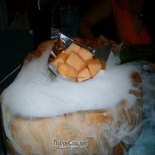 Melon atop dry ice at Pure Lotus - Jìng Xīn Lián 净心莲 in Beijing