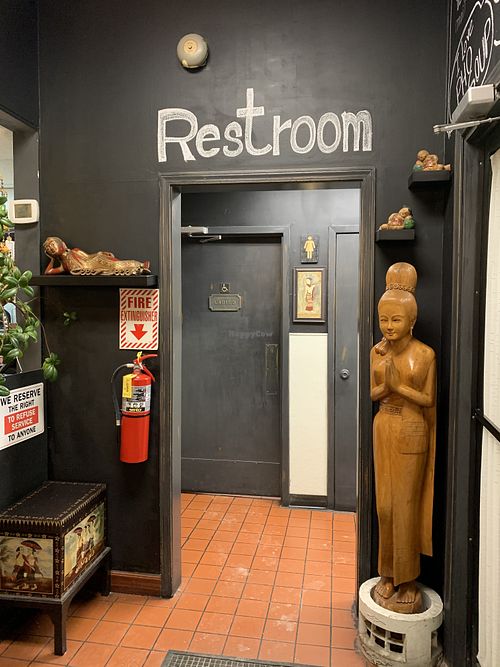 Restroom statues at Siam Cuisine in Anchorage