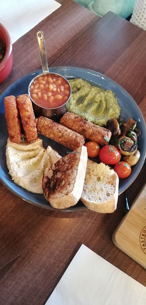 Has guacamole and hummus, veggie sausages, tomatoes mushrooms, hash browns and a choice of bread  at Tasteology in Birmingham