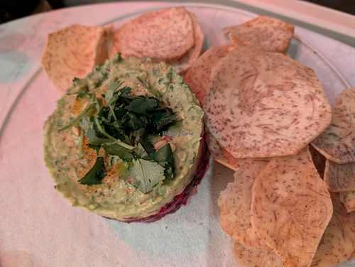 AVOCADO LIME TARTARE
beetroot tuna, pine nuts, capers, citrus soy, sesame, cilantro, taro chips, contains nuts - gluten free
 at PLANTA Cocina in Washington