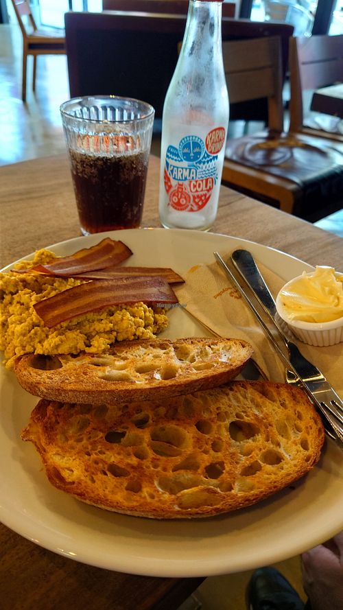 Scrambled tofu toast with bacon at Hustle in Belfast
