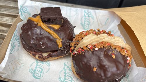 Chocolate orange fudge and chocolate biscoff donuts   at Belén Vegan Bakery in Wellington