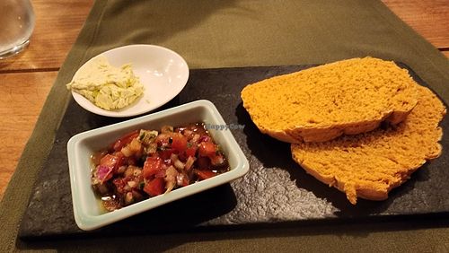 fresh bread with butter and salsa starter at Tierra Restaurante  in Sucre