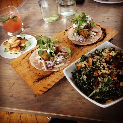 Side of king oyster mushroom "scallops", vish tacos(amazing!), and the kale caesar. Yum!! at enVie A Vegan Kitchen in Halifax