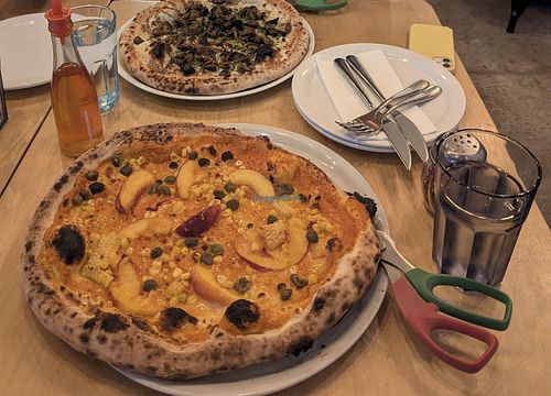 Vegan King Mushroom (top) and special peaches and corn (bottom) both fully vegan and both delicious! at Pizzeria Tratto Napoletana in Penticton