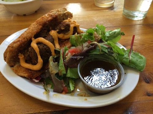 meatball sub and side salads at The Vegan Cafe in West Palm Beach