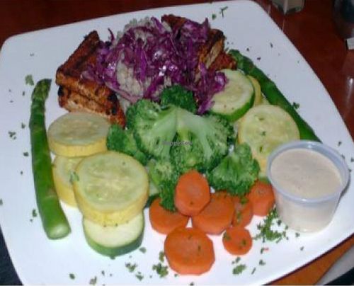 Blackened Tofu Feast: Blackened organic tofu, steamed vegetables, organic brown rice, and soy tahini sauce. at A Votre Sante in West Los Angeles