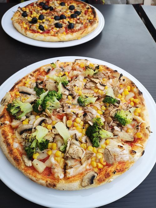 Vegan pizza with added mushrooms and corn at Lucky Pizzéria in Szeged