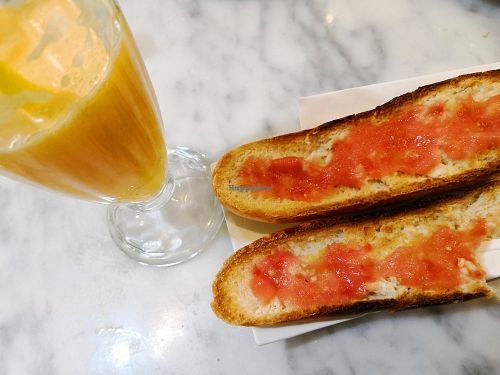 Zumo de laranxa + tostadas at Cafe Mandala in Salamanca