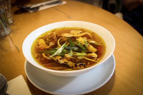 saffron soup with spring vegetables  at Estrella in Prague