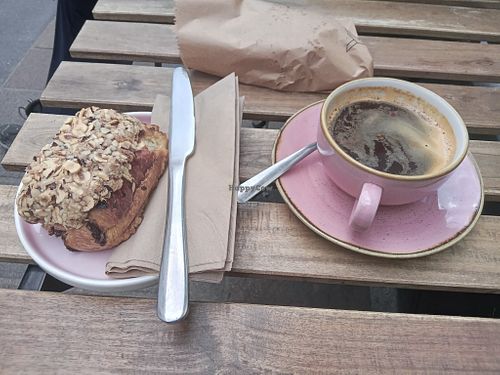Hazelnut pain au chocolat 😋 and an Americano. at Yonder   in Keswick