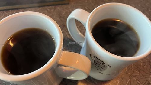  Black coffee in ceramic mugs at Biscuits Cafe  in Beaverton