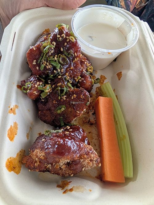 Sweet chili gochujang wings, but I already ate half of them at Vital Creations Vegan Bistro in Seattle
