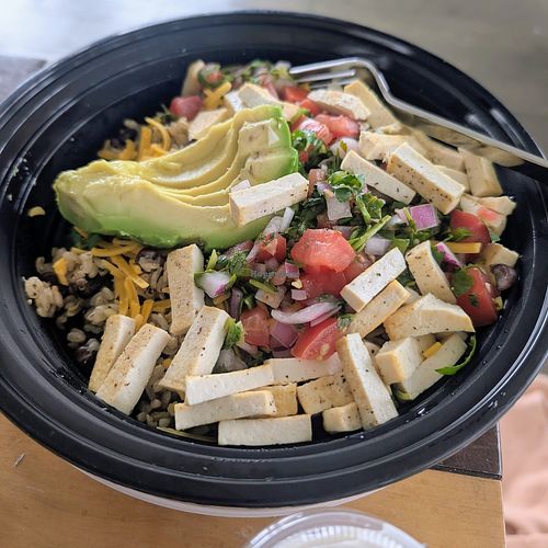 The whole bowl with tofu to go at Vital Creations Vegan Bistro in Seattle