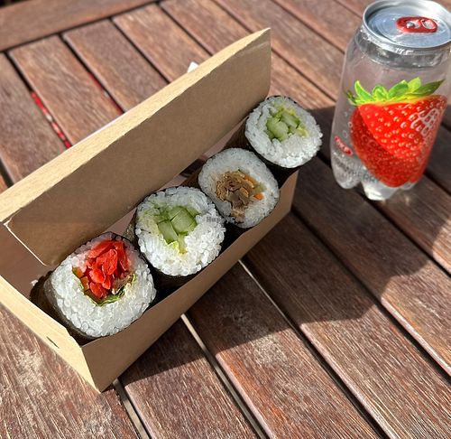 Japanese radish, shiitake mushroom, and cucumber avocado sushi rolls with sparkling strawberry bottled drink.  at Saiyuki Sushi in Stirling