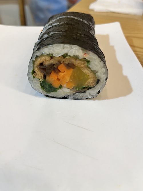fried tofu gimbap after I ate most of it  at Food Café Kimbab Heaven Sinsa Branch - 푸드카페김밥천국 신사점 in Seoul