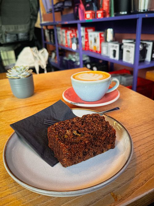 Vegan banana bread & oat flat white  at Playground Coffee in Hamburg