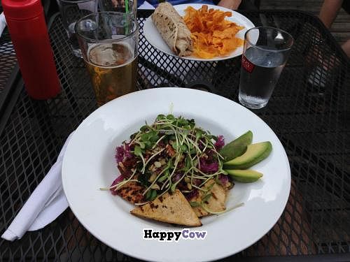 The California: quinoa (or brown rice), avocado, sun-dried tomatoes, and toasted nuts with arugula and tofu. at Lola's Kitchen in Toronto