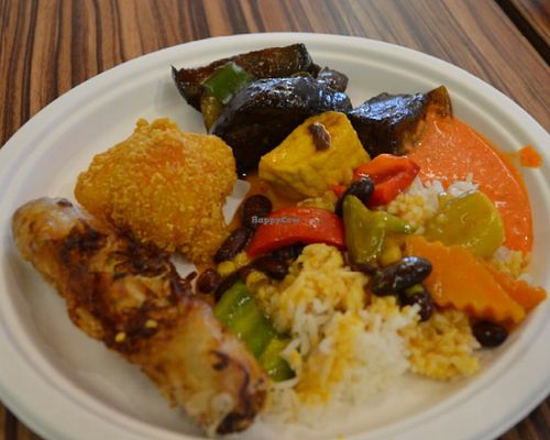 Eggplants (loved them), fried kaliflowers in clair, tofu curry with rice, carrot sauce. at Loving Hut - Radlicka in Prague