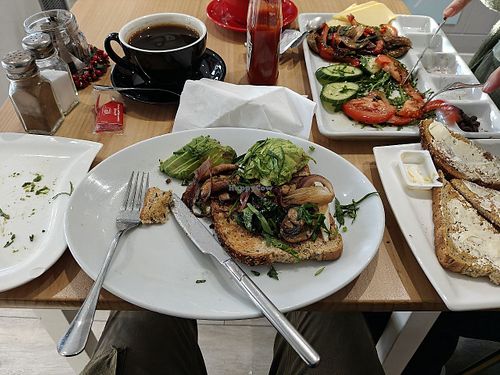 The vegan breakfast had mushrooms,sweet peppers,vegan cheese,a whole avocado,cucumbers,tomatoes and olives, plus 2 slices of bread at Evina's Coffee Shop in Seaford