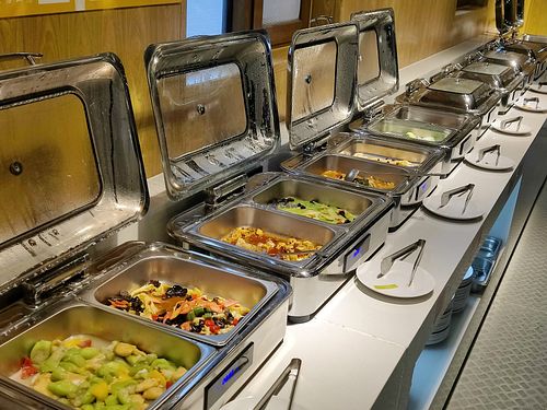 wide selection Buffet spread  at Emei JinDing Temple 华藏寺养怡山房 in Emeishan