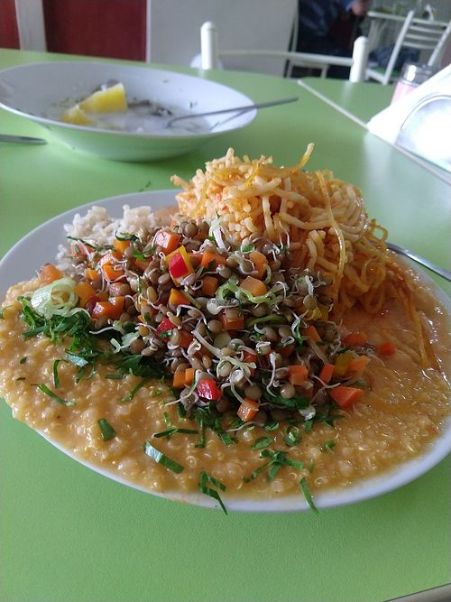 Meal of the day, noodle casserole, sprouted lentils, quinoa at El Gran Mana in Tacna