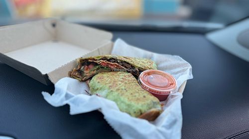Shroom Crunch Wrap
A crispy grilled tortilla filled with mushrooms, onions, peppers, spinach, salsa, and cilantro lime with a crunch tortilla in the middle. Served with hot sauce. at Shroomlicious Meals in Memphis