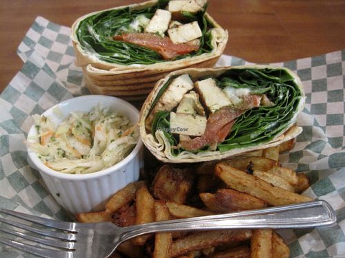 Rustique Sandwich (Marinated tofu, spinach, tomato, green onion, pesto, veganaise) with coleslaw and fries. The coleslaw and fries are perfect, but I was not overly pleased with the sandwich. It lacked some more veganaise or pesto. at Vegan Rapide - Sherbrooke in Montreal