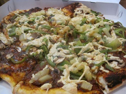 The À la Shannon pizza (mushrooms, garlic, green pepper, and pineapple) is really yummy. I recommend it. at Vegan Rapide - Sherbrooke in Montreal