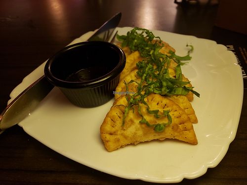 pumpkin momos with chilly chocolate sauce. good at Places Restaurant and Bar in Kathmandu