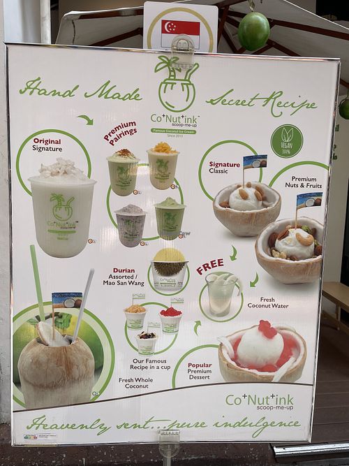 Street sign  at Co+Nut+Ink - Haji Ln in Central Singapore