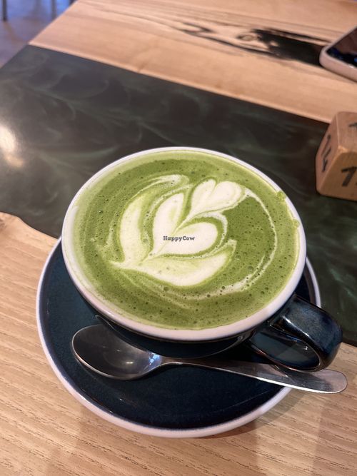 Oat matcha latte  at VINYL & WOOD - Get Lost in Wonderland in Budapest