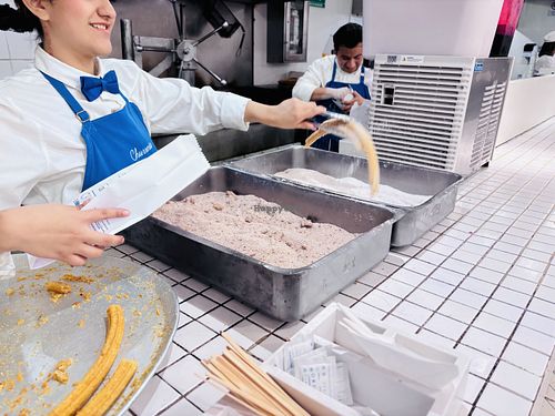 Churro maker  at El Moro in Mexico City