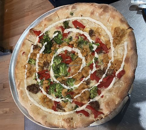 Build your own vegan pizza: garlic & olive oil, cheese, mac n cheese, meatballs, broccoli, red peppers, ranch sauce!  at Flying Saucer Pizza Company in Salem