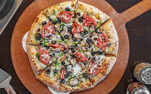 Fresh veggies, lots of options - even pickles for the pizza at Heavenly Dough Pizzeria in Oologah